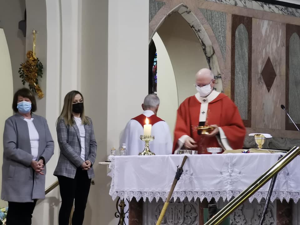 23 Archbishop Farrell prepares to distribute Holy Communion