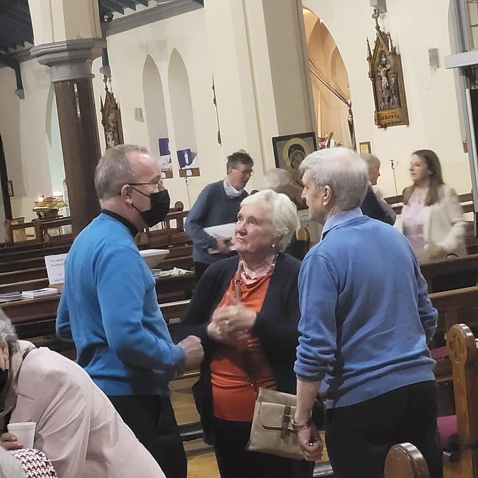 33 Fr Edwin McCallion SM chats to Angela and Tommy Moylan after the Mass