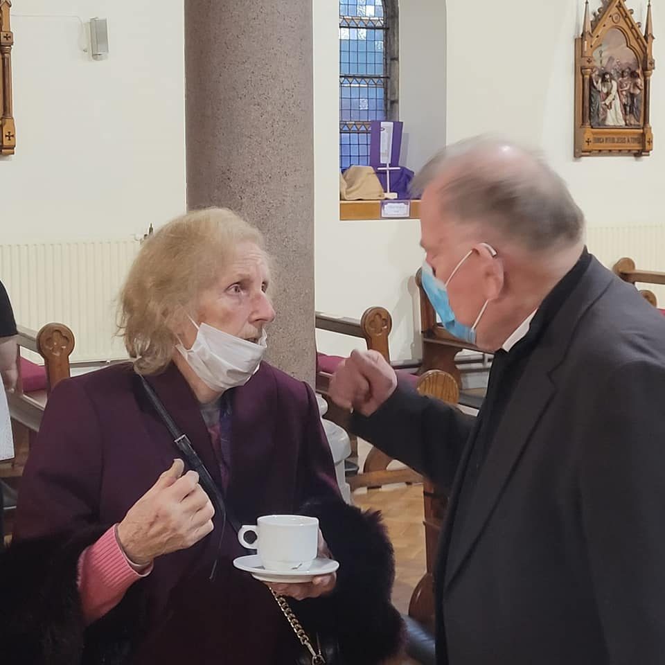 41 Kay Lee and Fr John Hannan SM chat after the Mass