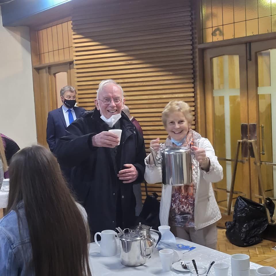 42 Sr Breeda serves tea to Fr Paddy Stanley SM after the Mass