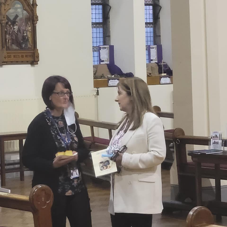 51 Sharon Hicks and Deirdre Farrell chat after the Mass